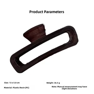 Detail view of a vintage wood grain hair claw clip showing 13x5.8cm size dimensions