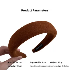 Detail view of coffee wool headband showing 16x14cm dimensions and soft fabric texture