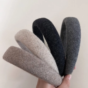 Padded wool headband set in neutral colors for a stylish high crown voluminous look