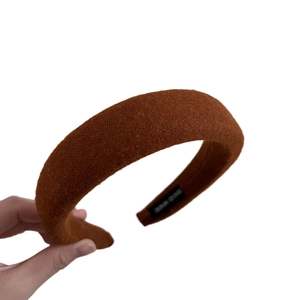 Minimalist thick sponge headband in caramel wool knit fabric for a stylish winter look