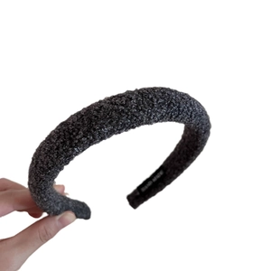 Thick grey faux shearling headband with a plush textured finish for a stylish look