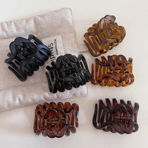 Assorted matte and glossy tortoise shell pumpkin hair claws in six elegant colors