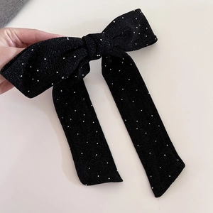 French vintage oversized black bow hair clip with silver sparkles and long ribbons