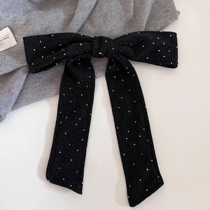 French vintage oversized black bow hair clip with silver glitter dots and long ribbons