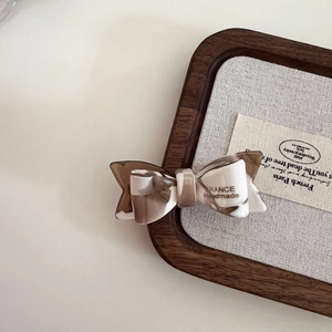 Elegant double-layered marble acetate bow hair clip with gold France Handmade lettering