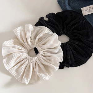 Elegant large pleated scrunchie set in cream and black with a subtle glossy finish