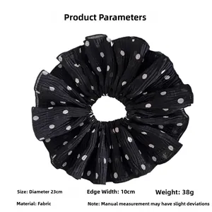 Polka dot fabric scrunchie detail showing 23cm diameter and 10cm width measurement