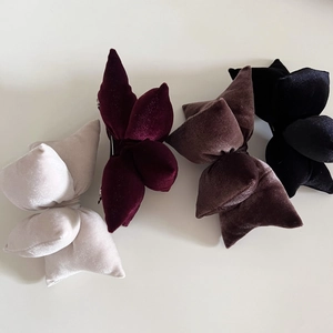 Set of four 3D padded velvet bow hair clips in cream, burgundy, brown, and black colors