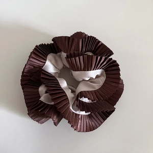 Brown and beige satin pleated scrunchie with a glossy silk-like finish and double layers