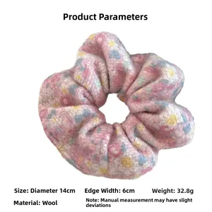 Detailed dimensions of pink floral wool scrunchie with 14cm diameter and 6cm width