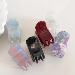 Set of 6 premium acetate hair claw clips in various marble and tortoiseshell patterns
