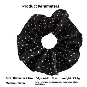 Paramètres de taille détaillés pour le grand chouchou en satin noir à pois de 23cm