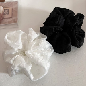 Elegant white and black mesh hair scrunchies with embroidered polka dots in a two-piece set