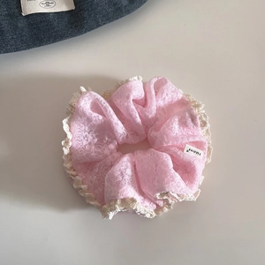 Pink lace hair scrunchie with white scalloped trim and embroidery for elegant updos