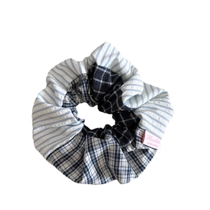 Striped plaid patchwork scrunchie for ponytails with handmade label on white background
