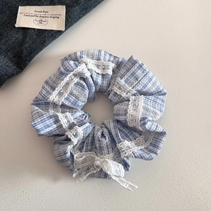 Blue plaid scrunchie with white lace edges and pearl detail for hair styling