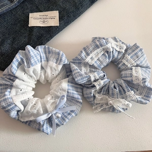 French style blue plaid scrunchie set with lace bow and pearl details on denim backdrop