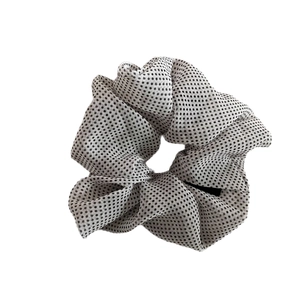 White French vintage mesh polka dot scrunchie with soft ruffled fabric texture