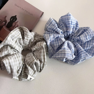 Set of two plaid scrunchies with lace trim in olive green and sky blue colors