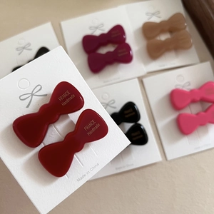 Vintage red acetate bow hair clips set for women with handmade gold lettering finish