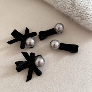 Elegant 4-piece set of black velvet bow hair clips with silver metallic beads