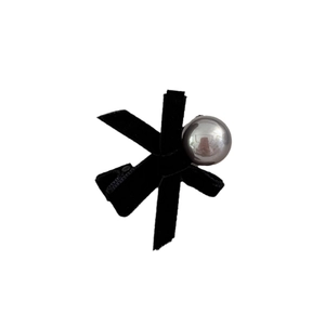 French vintage black velvet bow hair clip with a large silver pearl-like metal accent