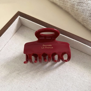 Elegante pinza per capelli in acetato rosso vino con scritta Barrette La France oro