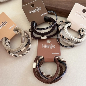 Set di 4 elastici per capelli marroni ad alta elasticità con fantasie leopardate e tinta unita