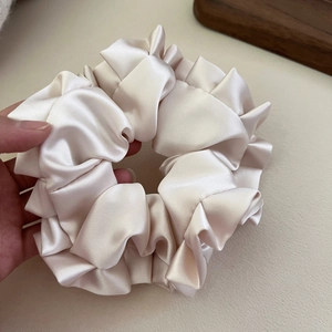 Champagne oversized satin scrunchie with layered ruffles for elegant hairstyles