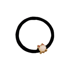 Elastic red festive hair tie with gold reindeer horn and pink resin stone accent