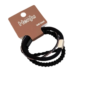 Set di 3 elastici per capelli marroni e neri con fibbia in metallo e motivi a trama