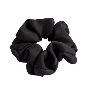 Elegant black satin scrunchie with jacquard ink bamboo patterns and silky texture
