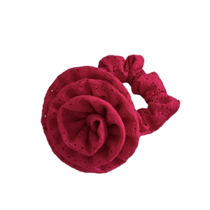 Vibrant red 3D rose hair scrunchie with eyelet embroidery for elegant styling