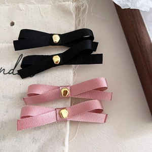 French vintage ribbon bow hair clips set with gold metal accents in black and pink