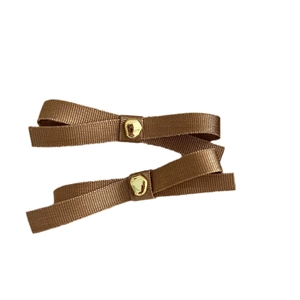 Set of two French vintage brown ribbon bow hair clips with elegant gold metal buckles