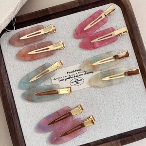 Elegant 10-piece acetate marble texture hair clip set with sparkling glitter finish