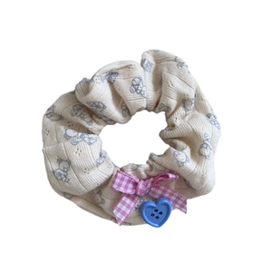 Cute knitted scrunchie with blue bear print and pink checkered bow ponytail holder