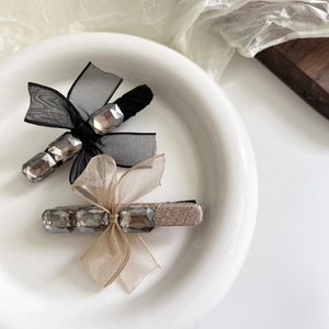 Barrettes à cheveux avec nœuds en résille, perles et strass en champagne et noir