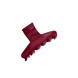 Elegant wine red acetate hair claw clip with golden lettering for hair styling