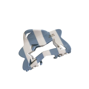 Blue and white striped acetate star claw clip with elegant gold Barrette La France lettering