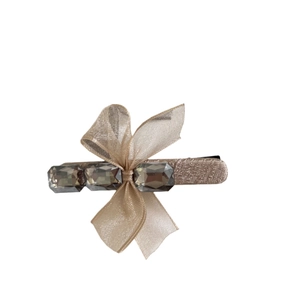 Pince à cheveux nœud en maille champagne avec cristaux gris fumé et base dorée raffinée