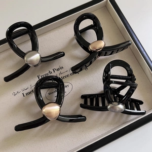 Lot de quatre pinces à cheveux style français noir brillant avec perles dorées