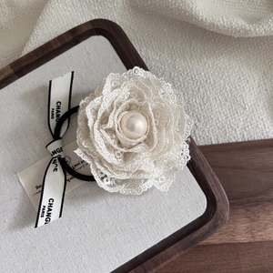 Elegant beige lace scrunchie with large pearl and vintage French style ribbon detail