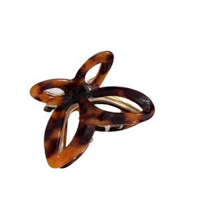 Elegant butterfly shaped acetate hair claw clip with classic brown tortoiseshell pattern