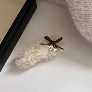 Fermaglio per capelli in rete beige con fiocco marrone e ciondolo dorato elegante