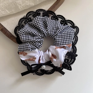 Sweet plaid scrunchie with lace edges, ribbon bow, and bear print for cute ponytail styles