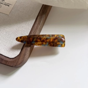Amber marble acetate hair clip with France Handmade text and teardrop retro design
