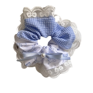 Sweet blue plaid scrunchie with lace trim, cartoon rabbit print, and pearl bow detail