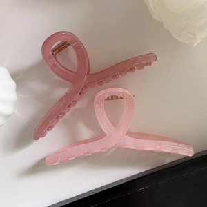 Large pink jelly hair claw clips for thick hair set with stylish ribbon twist design