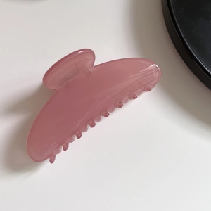 Große, geleeartige rosa Haarklammer für elegante Damenfrisuren, stilvolles Accessoire